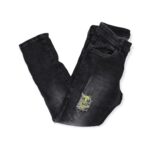 Παιδικό τζίν παντελόνι " Μαύρο ξεβαμμένο με σκασίματα και κίτρινες φωσφοριζέ λεπτομέρειες "