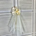 Λαμπάδα βάπτισης ”Λουλούδι με φιόγκο και αρχικό“